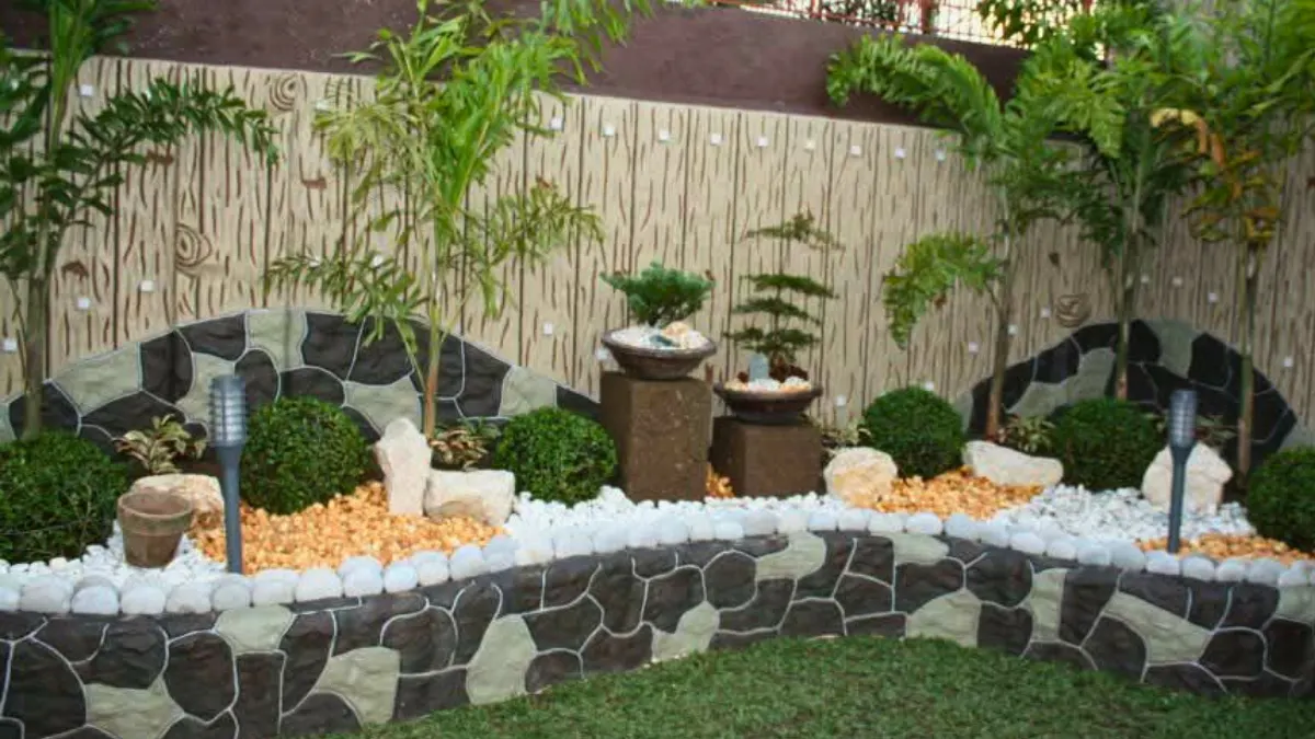 Zen garden with stone wall and fountain